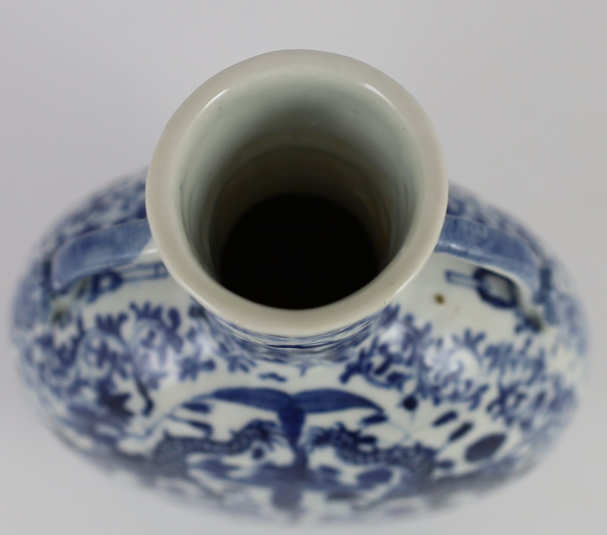 A Chinese blue and white ‘dragon’ moon flask, late 18th century, 20cm high
